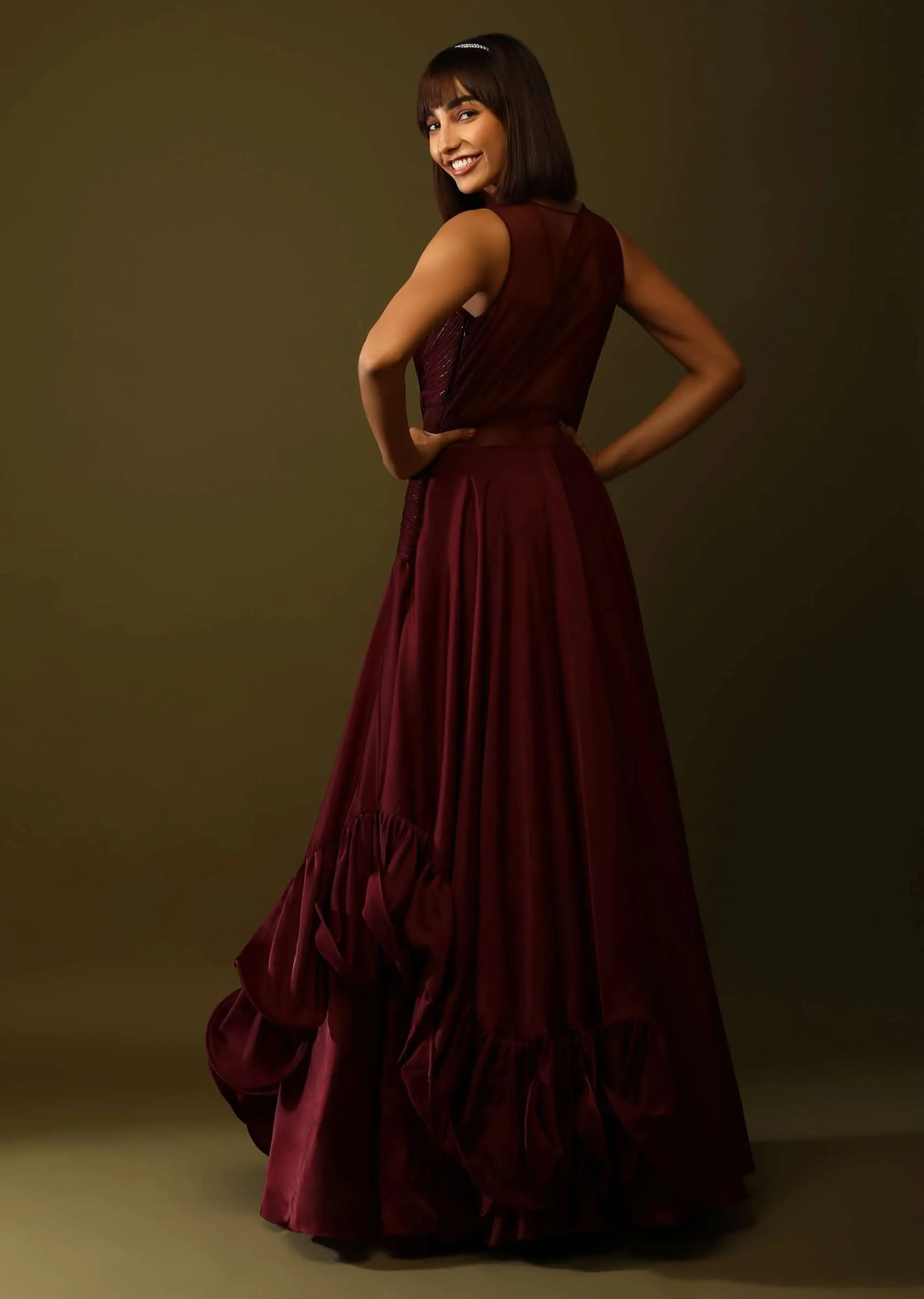 Maroon Gown With Ruched Bodice And Fancy Ruffled Hem