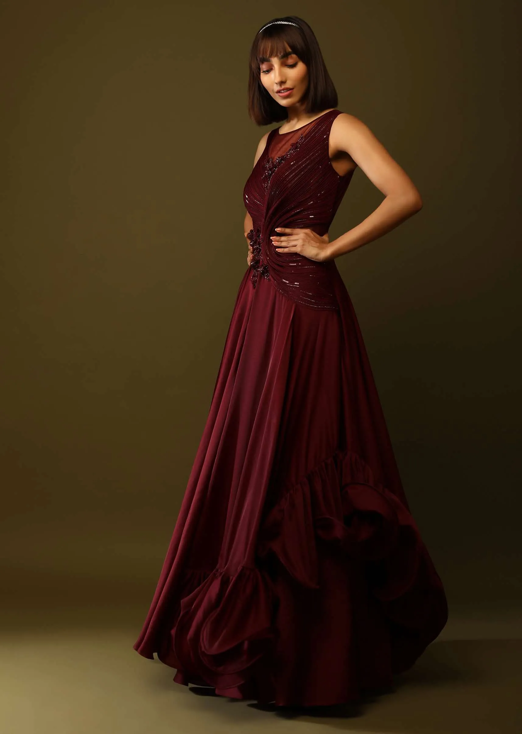 Maroon Gown With Ruched Bodice And Fancy Ruffled Hem