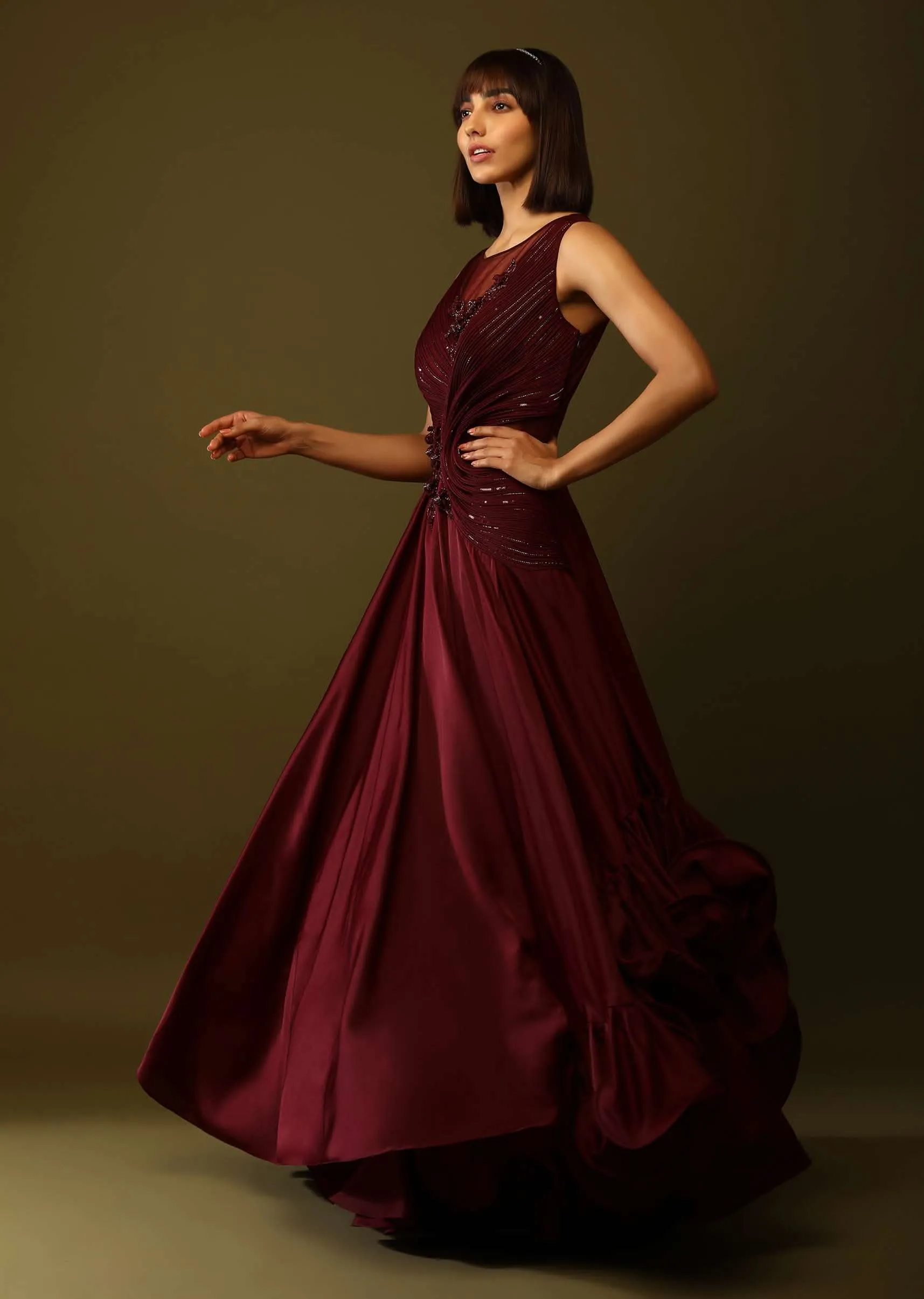 Maroon Gown With Ruched Bodice And Fancy Ruffled Hem